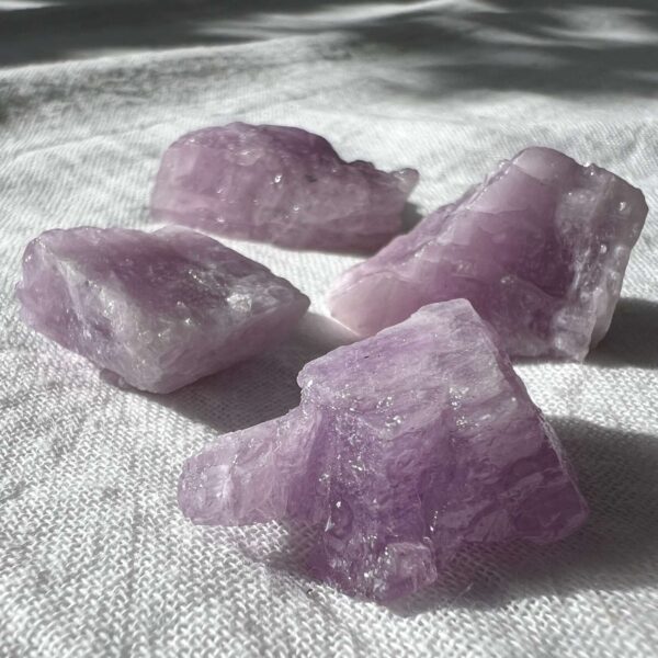 Natural kunzite spodumene lithium aluminium silicate lilac crystal