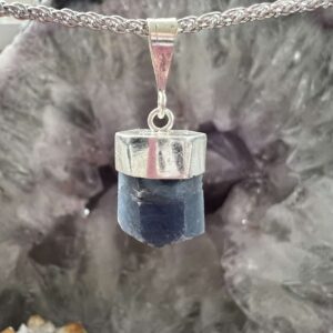 sapphire pendant opaque blue gemstone set in silver