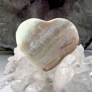 Caribbean calcite heart polished natural mineral to hold and love