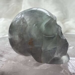 green fluorite skull carved crystal skull heart chakra mental focus planning structure