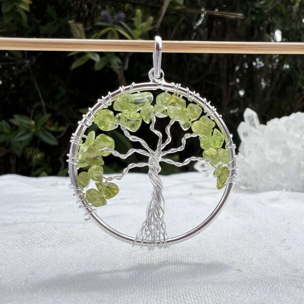 tree of life peridot pendant crystal necklace ancient symbolism